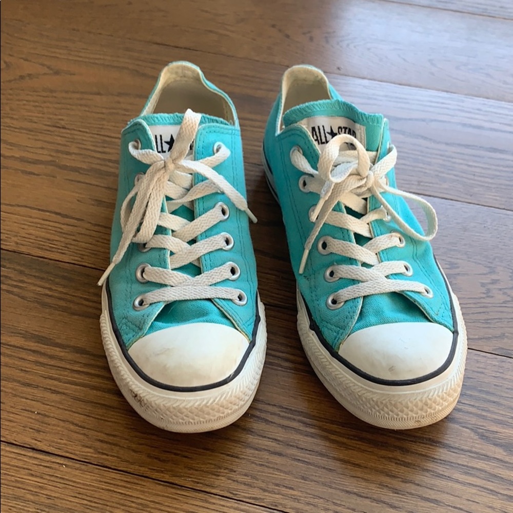 Aqua colored low top Converse